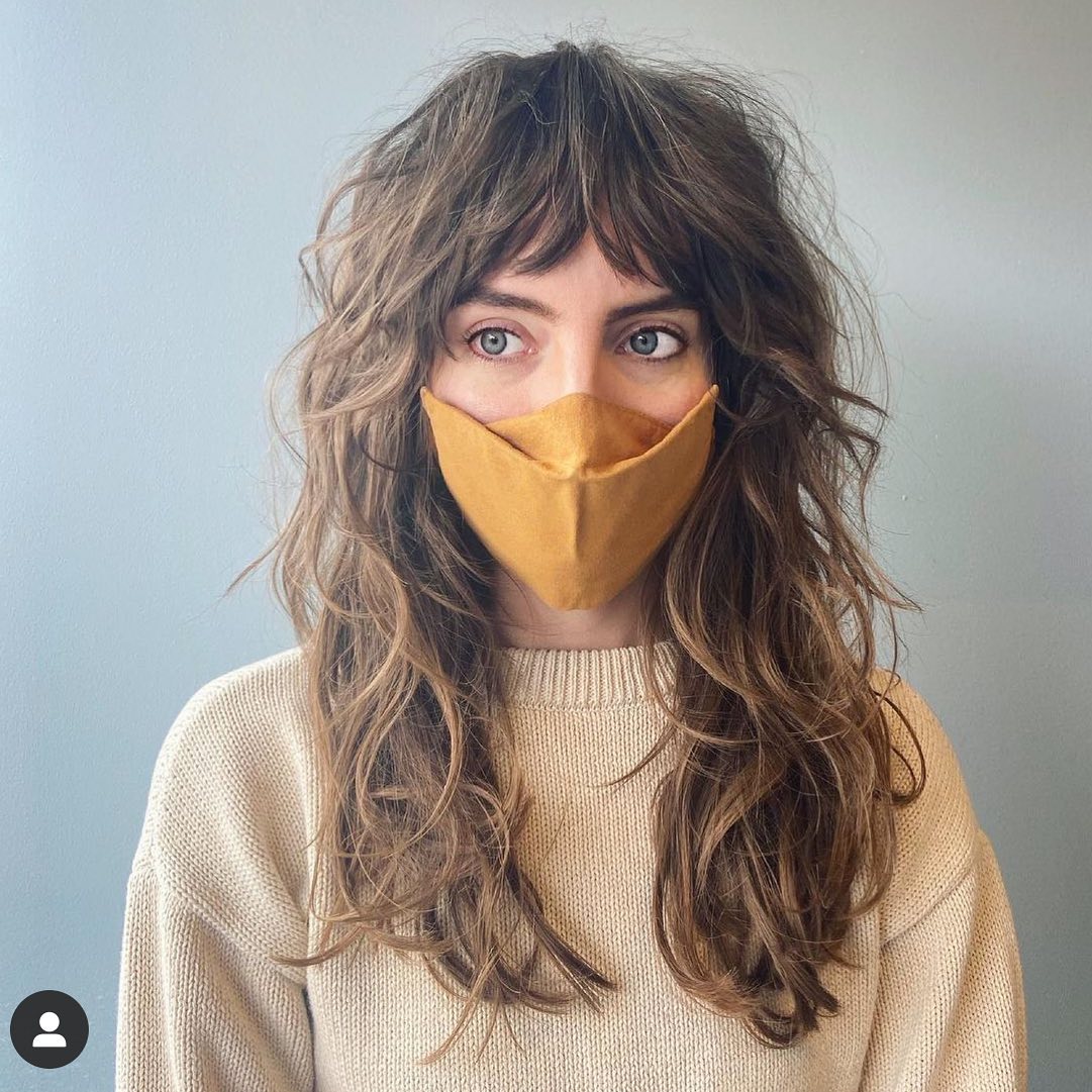 19. Classic Curly Shag with Layered Texture