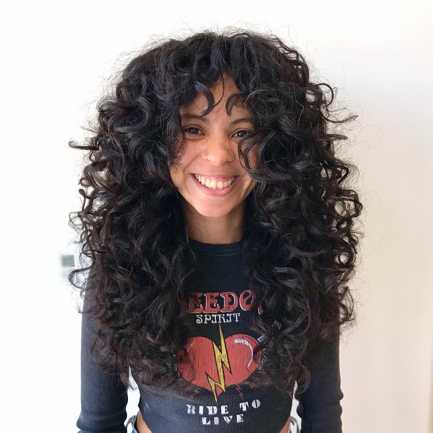 82. Curly Shag with Feathered Layers